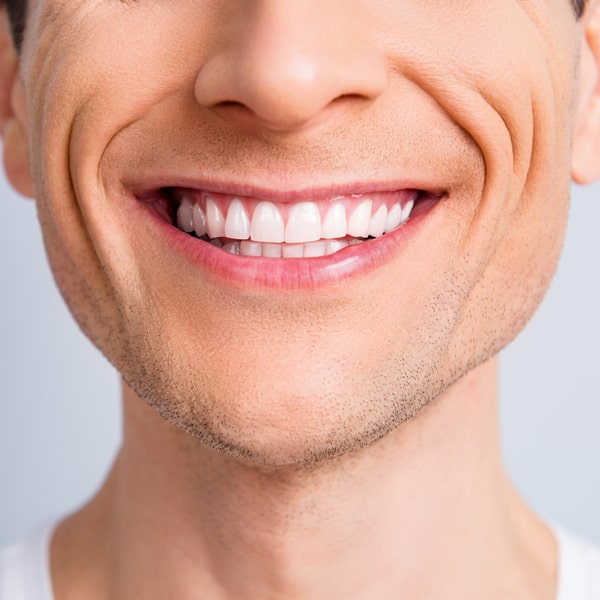 Close Up Photo of a man's smile